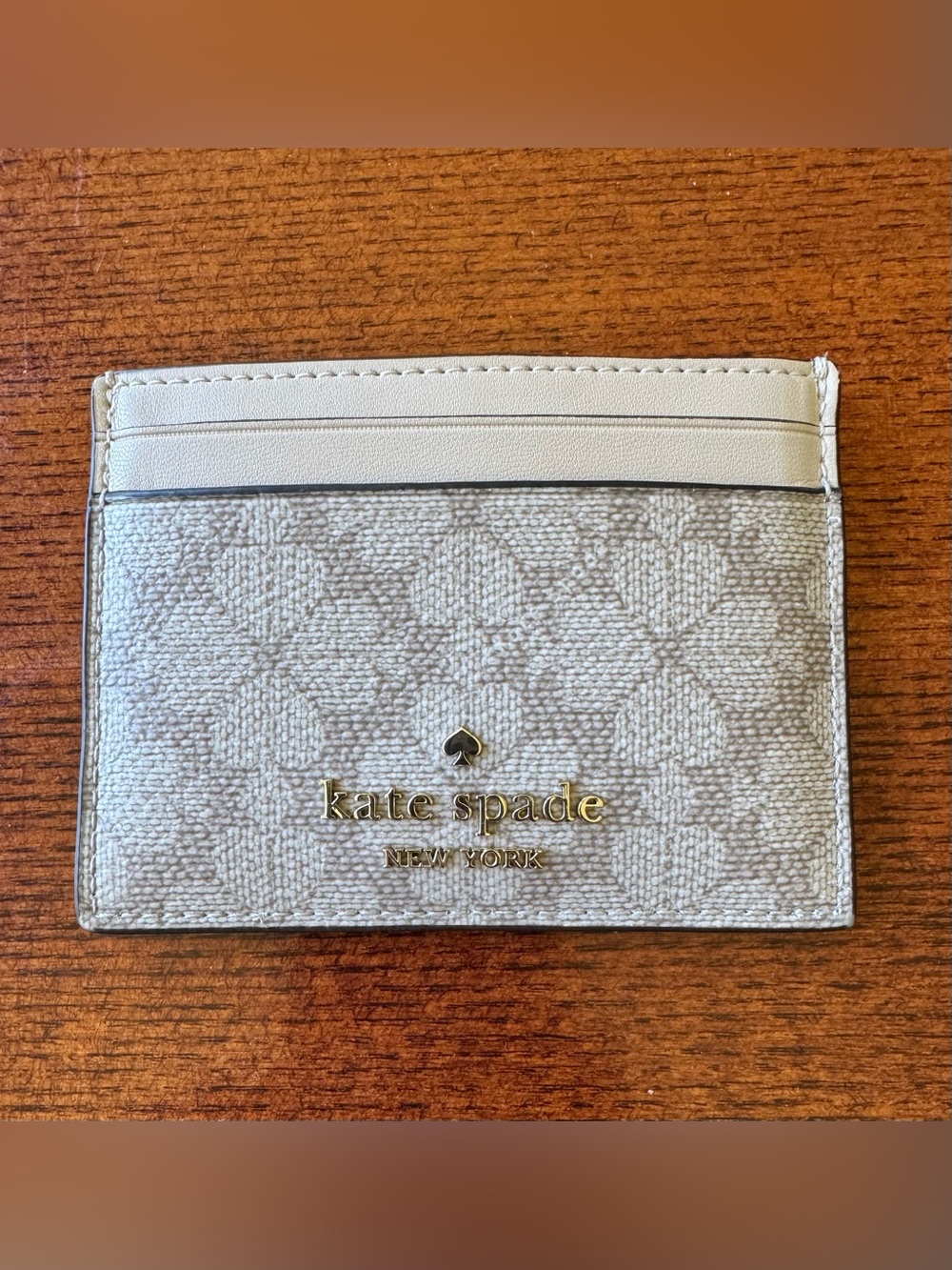 Kate Spade Cream and White Textured Card Case with Gold Logo